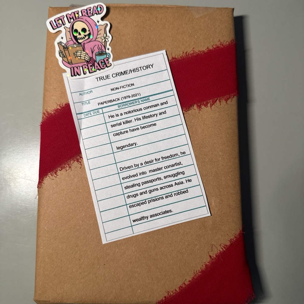 Brown and Red Wrapped Book with Sticker